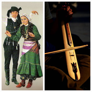 Traditionelle türkische Folklorebekleidung aus der Schwarzmeerregion mit dem Instrument Kemençe